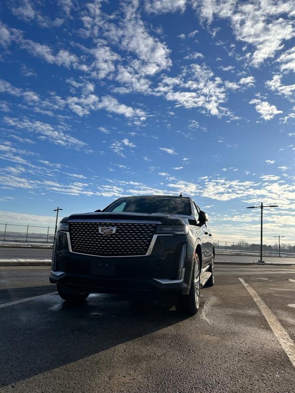 Cadillac Escalade in empty parking lot